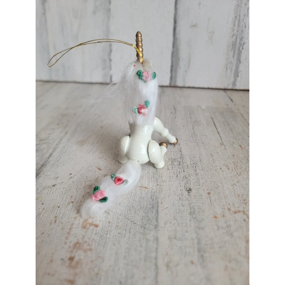 Vintage Kurt Adler unicorn sitting wooden ornament Xmas flower figure